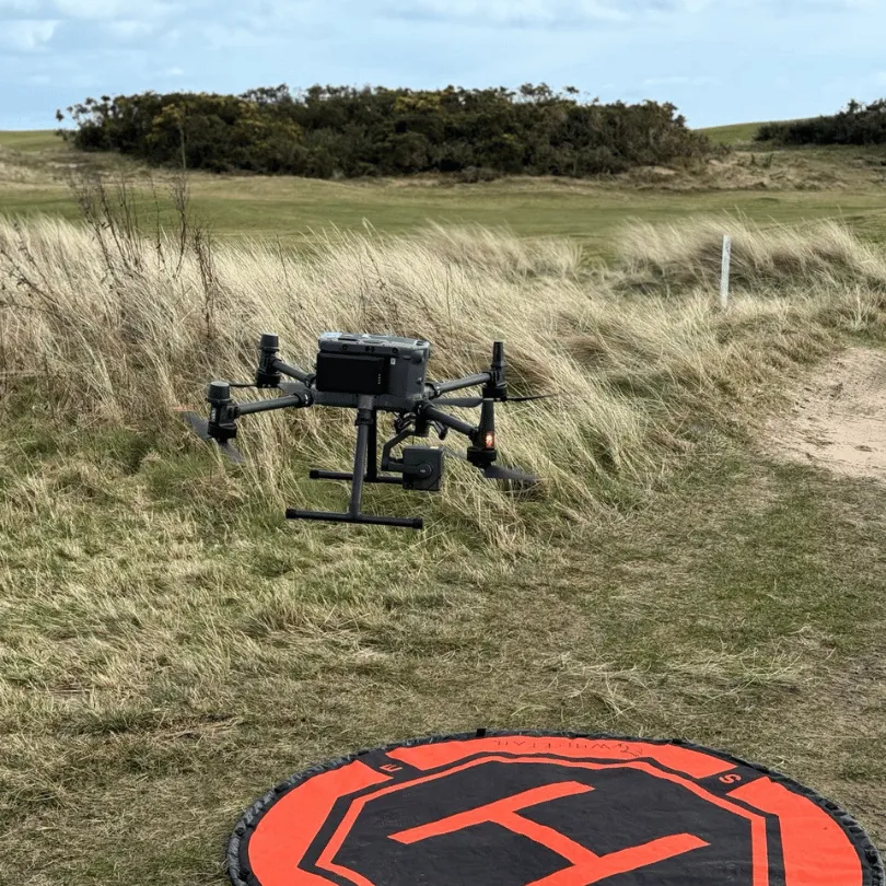 drone taking off in gusts of wind